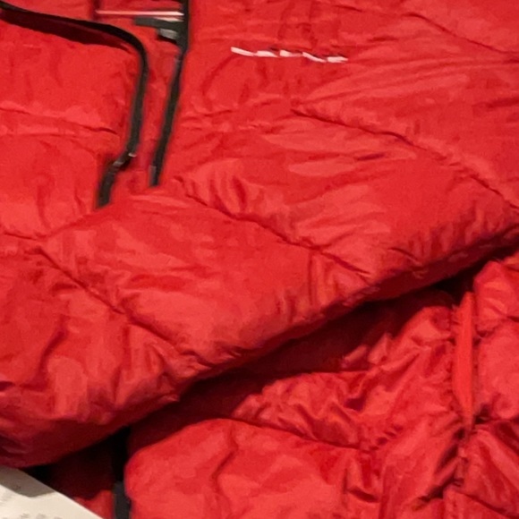 I am selling a brand new NFL Atlanta Falcon puffer jacket. - Picture 2 of 2